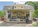 Backyard patio with pergola covering, built-in benches, and outdoor seating area at 420 S Cedar St, Lincolnton, NC 28092