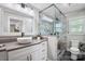 Tastefully remodeled bathroom featuring a modern shower, cabinetry, vessel sink, and hardware at 420 S Cedar St, Lincolnton, NC 28092
