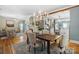 Open-concept dining room flowing into the living room and kitchen, perfect for entertaining guests at 420 S Cedar St, Lincolnton, NC 28092