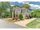 Charming two-story home with a well-manicured lawn and beautiful landscaping, offering great curb appeal at 420 S Cedar St, Lincolnton, NC 28092