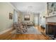 Inviting living room featuring hardwood floors, neutral walls, chandelier, and stylish decor at 420 S Cedar St, Lincolnton, NC 28092