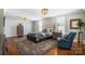 Spacious main bedroom with a large rug, wood floors, ensuite, and ample closet space at 420 S Cedar St, Lincolnton, NC 28092