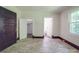 Bedroom with closet and bathroom access featuring beautiful floors and natural light at 435 W Whitley St, Norwood, NC 28128
