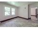 Bedroom featuring neutral walls, hardwood-look flooring, and ample natural light at 435 W Whitley St, Norwood, NC 28128