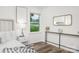 Bedroom showcasing stylish decor and a view of the outdoor landscape at 4633 Old Mill Rd, Gastonia, NC 28056