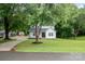 Charming two-story home with a well-manicured lawn and mature trees in a desirable neighborhood at 4633 Old Mill Rd, Gastonia, NC 28056