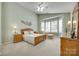 Spacious bedroom with bay window, ceiling fan, and plush carpeting at 539 Turquoise Way, Fort Mill, SC 29708
