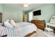 Bedroom featuring a ceiling fan, white stool, and carpet flooring at 539 Turquoise Way, Fort Mill, SC 29708