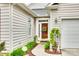 Inviting front entrance with a decorative wreath, and beautiful landscape at 539 Turquoise Way, Fort Mill, SC 29708