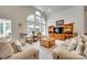 Bright living room features a large window and comfortable seating at 539 Turquoise Way, Fort Mill, SC 29708