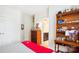 Bedroom featuring a wooden dresser and glimpses of an ensuite bathroom at 5424 Morris Hunt Dr, Fort Mill, SC 29708