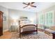 Cozy bedroom featuring a queen-size bed, plush rug, and large windows at 5424 Morris Hunt Dr, Fort Mill, SC 29708