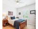 This bedroom boasts a ceiling fan, a single window, and a relaxing ambiance for restful nights at 5424 Morris Hunt Dr, Fort Mill, SC 29708