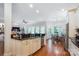 Eat in kitchen with stainless appliances, granite counters, a breakfast nook, and hardwood floors at 5424 Morris Hunt Dr, Fort Mill, SC 29708
