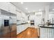 This spacious kitchen is equipped with stainless steel appliances, granite counters, and custom cabinets at 5424 Morris Hunt Dr, Fort Mill, SC 29708