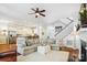 Open-concept living room with a staircase and view into the adjacent kitchen at 5424 Morris Hunt Dr, Fort Mill, SC 29708