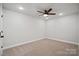 This bedroom features neutral paint, carpet flooring, recessed lighting, and a ceiling fan at 6712 W Sugar Creek Rd, Charlotte, NC 28269
