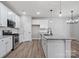 Modern kitchen with stainless steel appliances, granite countertops, and ample cabinet space, ideal for culinary enthusiasts at 6712 W Sugar Creek Rd, Charlotte, NC 28269