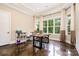 Bonus room features a large table and window views of the outdoor landscaping at 6873 Pine Moss Ln, Clover, SC 29710