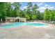Inviting community pool with ample seating and manicured surroundings at 6873 Pine Moss Ln, Clover, SC 29710