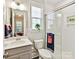 Bathroom featuring a shower, toilet, sink, and neutral colored towels at 705 Vintage Creek Dr, Matthews, NC 28104