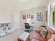 Cozy room with desk area, natural light, and comfortable seating at 705 Vintage Creek Dr, Matthews, NC 28104