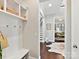 Hallway with custom mudroom, staircase and view of the entryway at 705 Vintage Creek Dr, Matthews, NC 28104