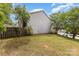Backyard of the home featuring a lawn and trees at 7304 Pebblestone Dr, Charlotte, NC 28212