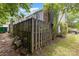 Backyard with a wood fence and a view of the home's exterior at 7304 Pebblestone Dr, Charlotte, NC 28212