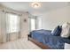 Bedroom with carpet flooring, natural light, and a wooden frame bed at 7930 Kelburn Ln, Charlotte, NC 28273