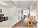Warm and inviting foyer featuring gleaming hardwood floors and neutral paint at 7930 Kelburn Ln, Charlotte, NC 28273