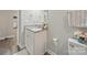 Well-lit bathroom featuring granite countertop vanity and modern fixtures at 900 4Th St, Spencer, NC 28159
