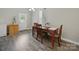 Cozy dining area with wood table set, seamlessly connected to the living space at 900 4Th St, Spencer, NC 28159