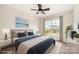 Comfortable bedroom with a ceiling fan, large window and neutral decor at 9009 Odell Corners Nw Blvd, Concord, NC 28027