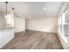 Open floor plan featuring a seamless transition from the kitchen to the bright, spacious living area at 9009 Odell Corners Nw Blvd, Concord, NC 28027