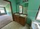 Bathroom featuring a double vanity, with a view of the tub and shower area at 9044 Forington Ln, Gastonia, NC 28056