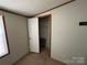 Cozy bedroom features neutral tones, closet access, and natural light at 9044 Forington Ln, Gastonia, NC 28056