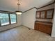 View of dining room with tile floors and windows at 9044 Forington Ln, Gastonia, NC 28056