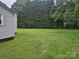 Flat backyard with mature trees at 905 Klondale St, China Grove, NC 28023