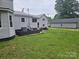 Large backyard with patio area and detached garage/storage building at 905 Klondale St, China Grove, NC 28023