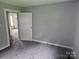 Bedroom has updated gray paint and carpet at 905 Klondale St, China Grove, NC 28023