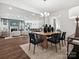 Open concept room with living, dining, and kitchen area that offer a lot of natural light at 1029 Mapletree Ln, Indian Trail, NC 28079