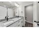 Bathroom featuring double sink vanity with granite counters and modern fixtures at 105 Spring Garden Dr, Gastonia, NC 28052