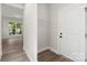 Welcoming entryway with hardwood floors, coat closet, and natural light creates a warm first impression at 105 Spring Garden Dr, Gastonia, NC 28052