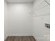Spacious laundry room with utility connections and shelf at 105 Spring Garden Dr, Gastonia, NC 28052