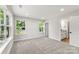 Large main bedroom with ensuite bathroom, neutral colors, carpeted floor, and natural lighting at 105 Spring Garden Dr, Gastonia, NC 28052
