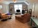 Bonus room featuring plush seating, a ceiling fan, and a window for lots of natural light at 1115 John Short Rd, Indian Land, SC 29707