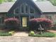 Inviting front entrance with stone path and mature landscaping at 1115 John Short Rd, Indian Land, SC 29707