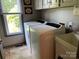Laundry room featuring a washer, dryer, window, and basin sink at 1115 John Short Rd, Indian Land, SC 29707