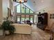 Spacious living room with vaulted ceiling and a wall of windows at 1115 John Short Rd, Indian Land, SC 29707